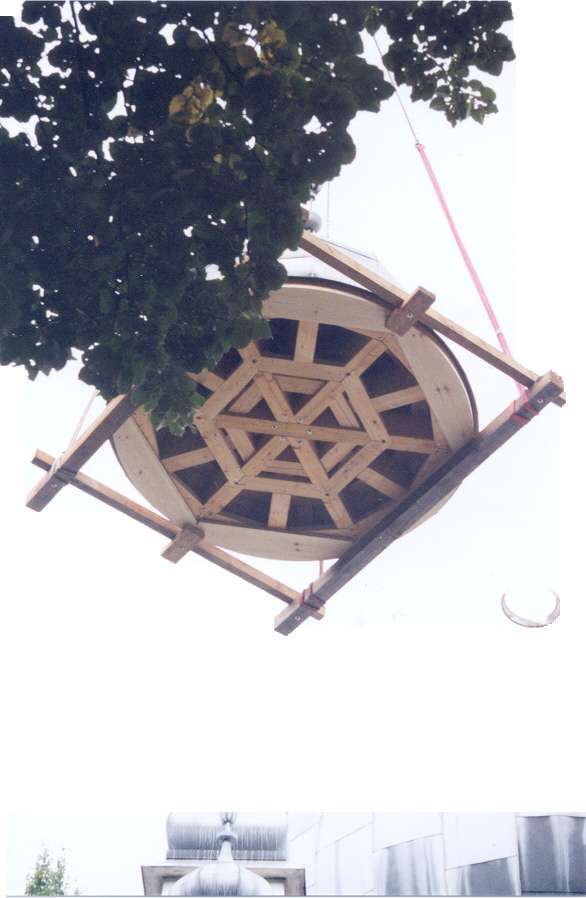 Cupola being lifted by crane 