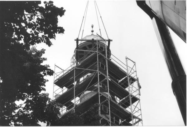 Cupola being placed on top of Minaret